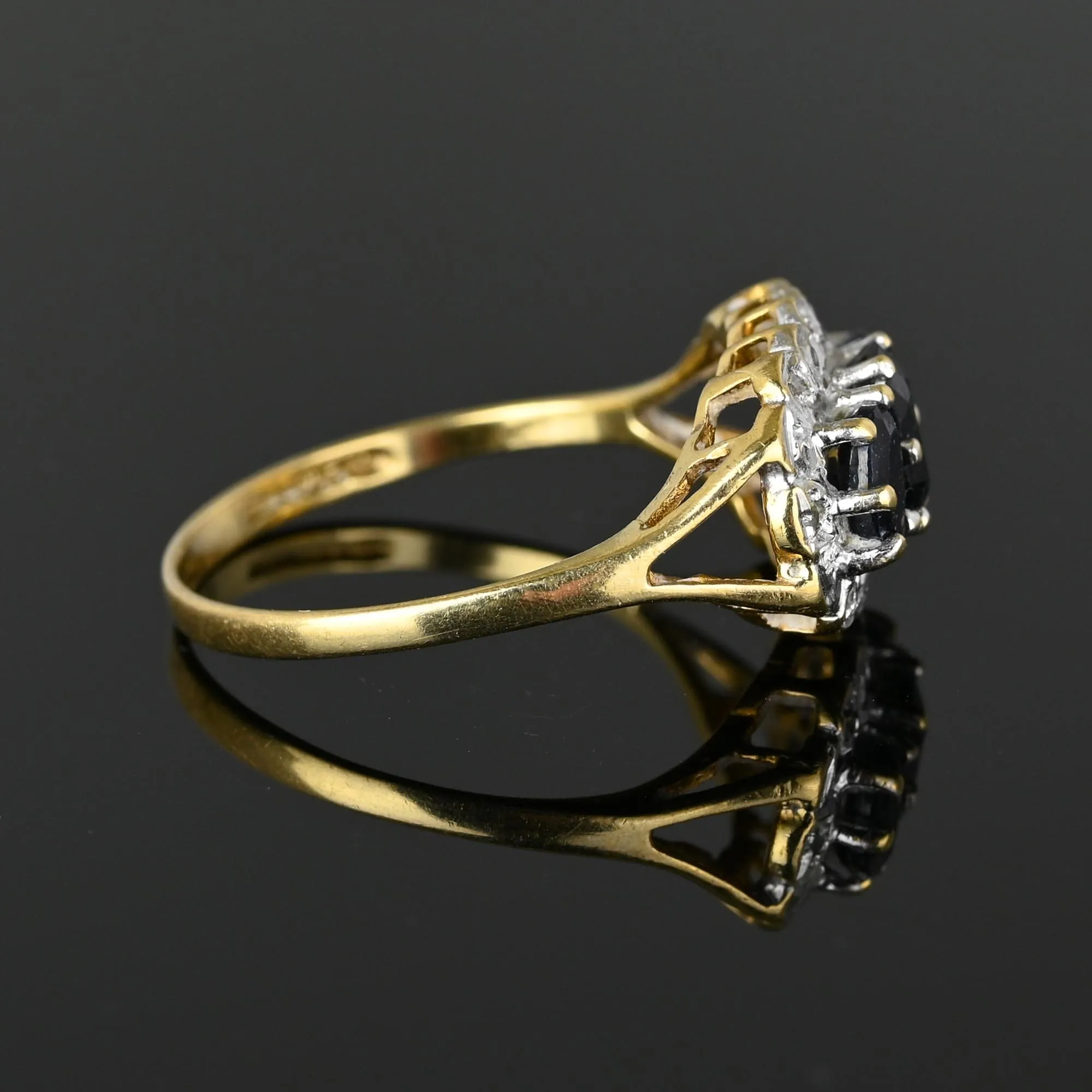 Diamond Halo Three Stone Sapphire Ring in Gold